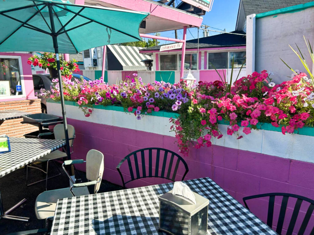 View of the colorful outdoor patio of Westside Drive-In