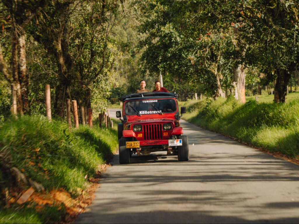 Men enjoying the Willys jeeps ride in Salento