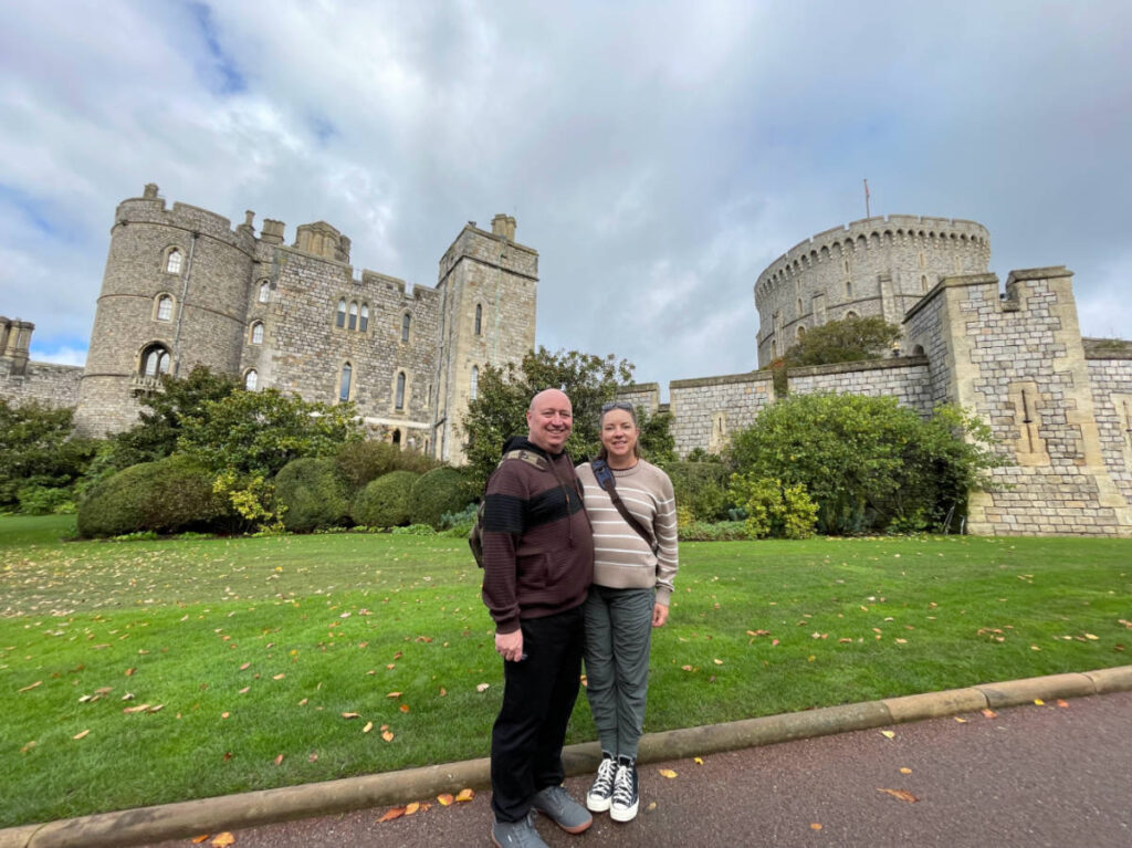The author Laura Falin with her husband with the Windsor Castle at their background