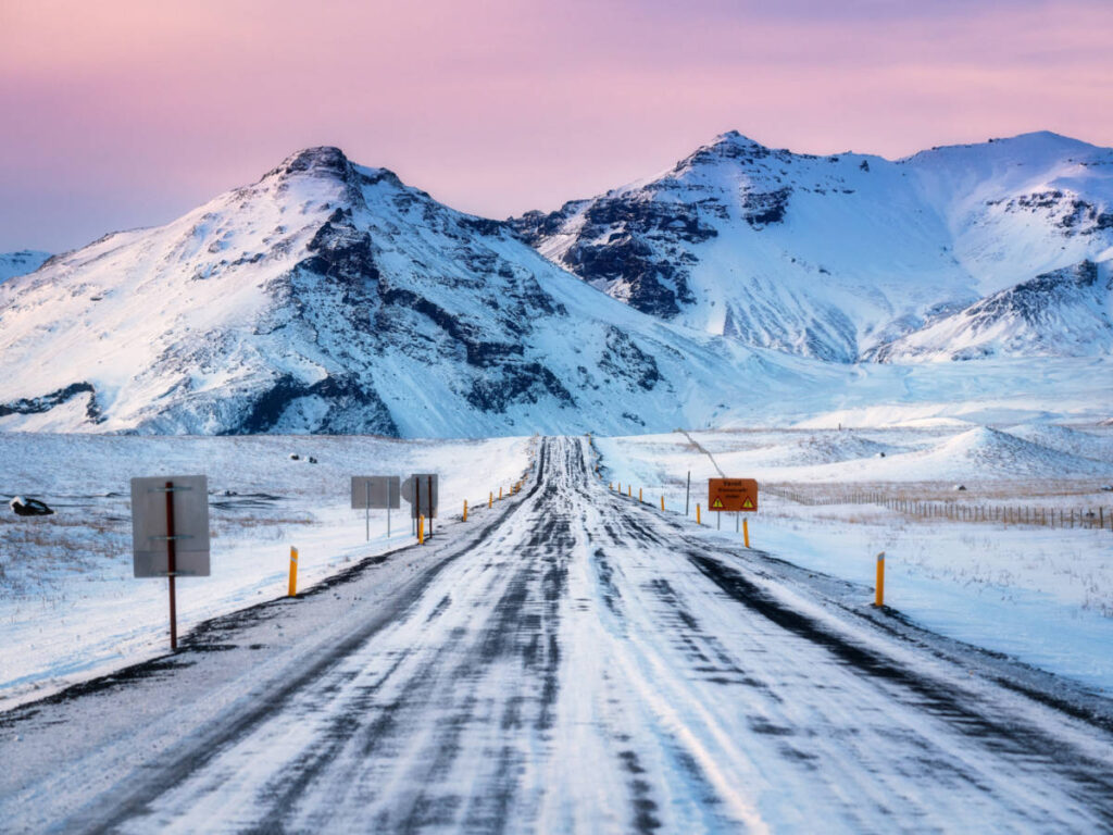 Scenic snow covered mountain views from Ring Road Route 1 at sunset