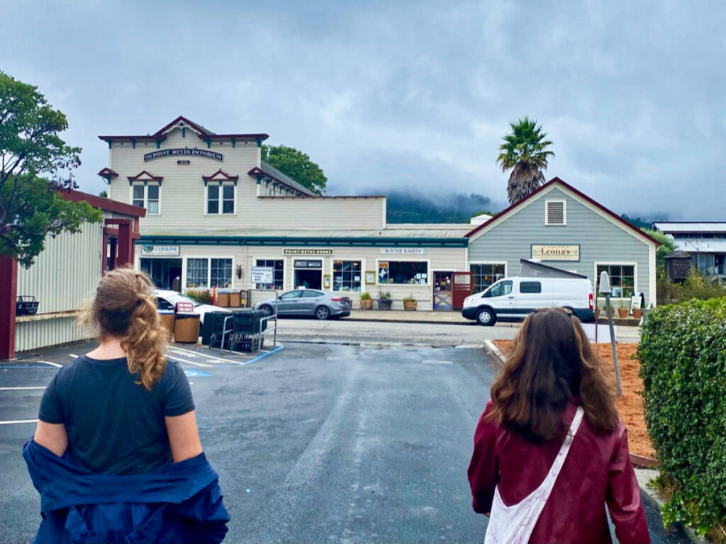 Two women walking to the bakery and bookstore in Point Reyes Station