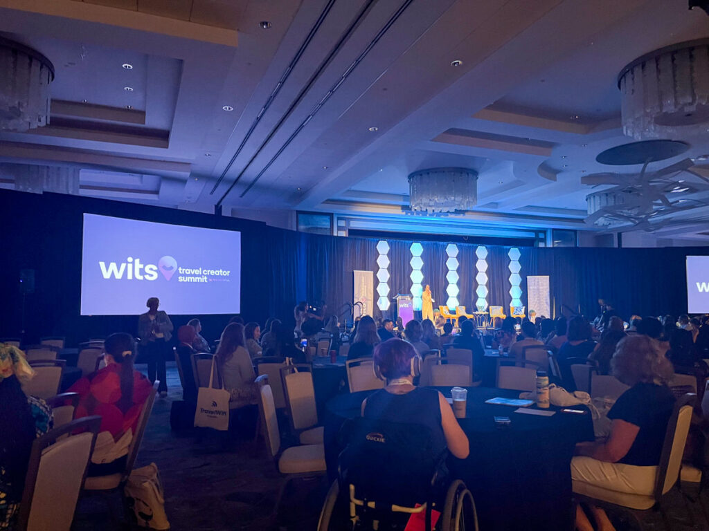 Groups listening to the speaker at Women in Travel Summit in San Juan
