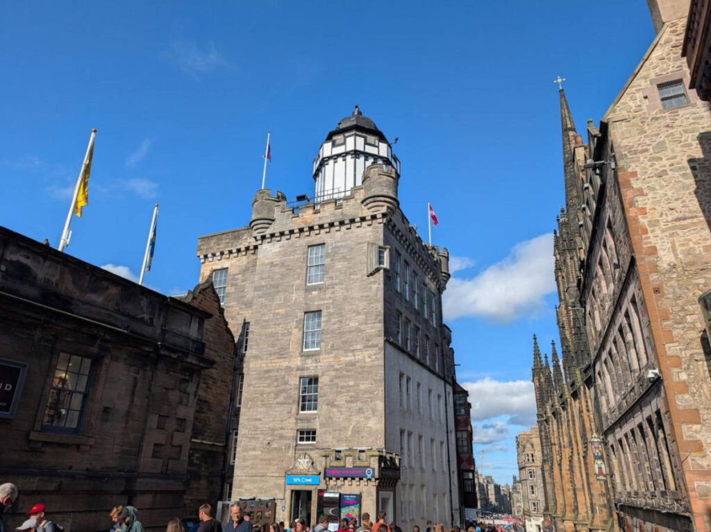 The building of the World of Illusions with a clear blue sky in the background