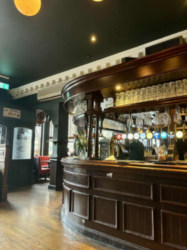 The wrap-around bar inside The White Horse