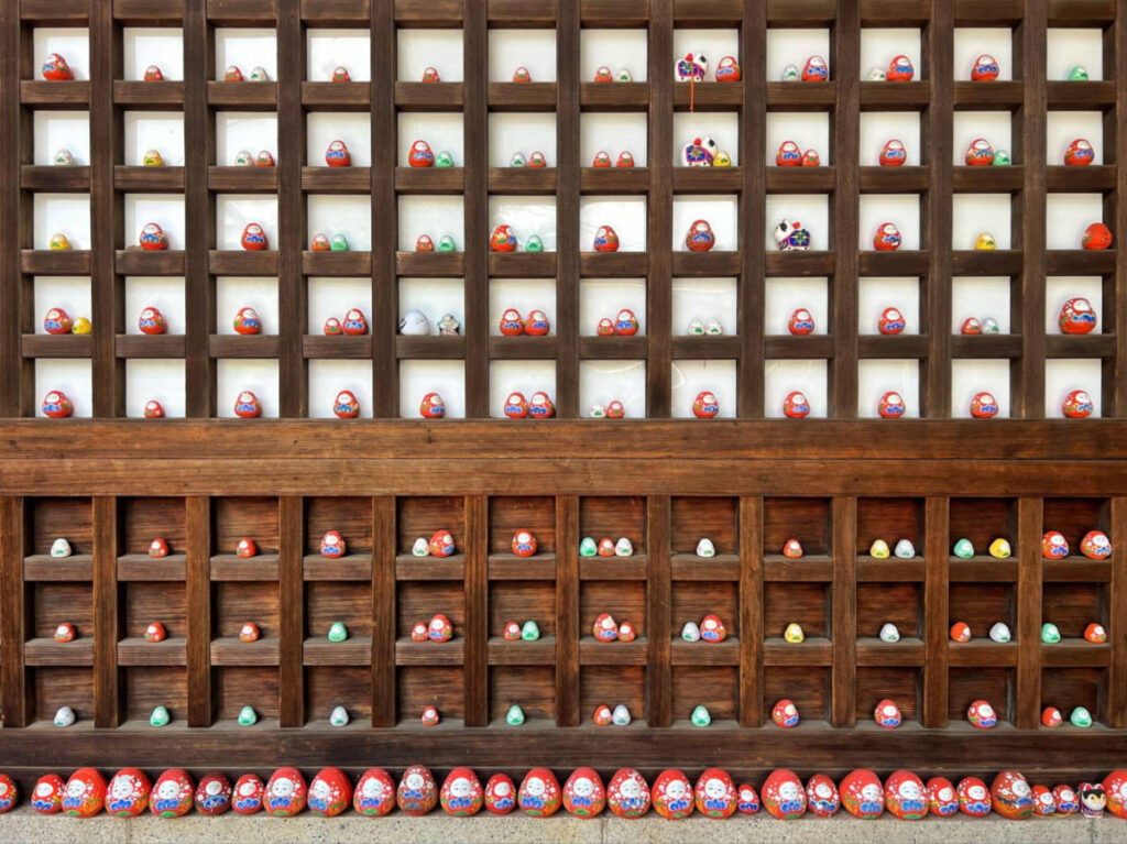 View of Hachiman dolls left at Yasue Hachimangu Shrine