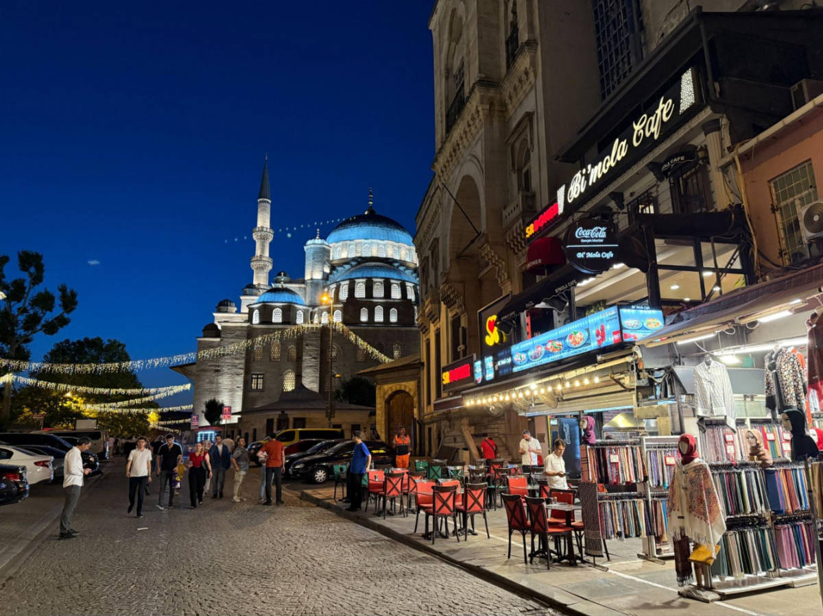 The Yeni Mosque glows baby blue at night