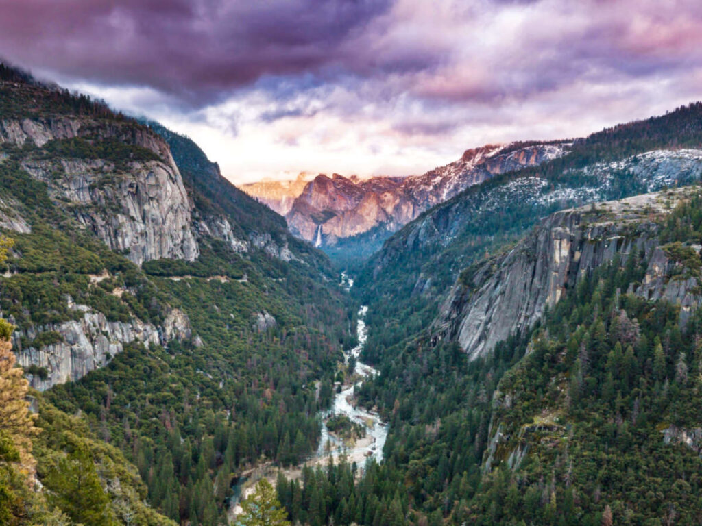 Aerial view of the fall foliage around the landscape of the Yosemite Valley in sunset