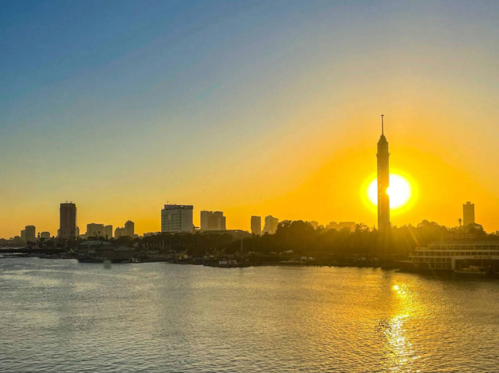Scenic view of the sunset behind the Cairo Tower