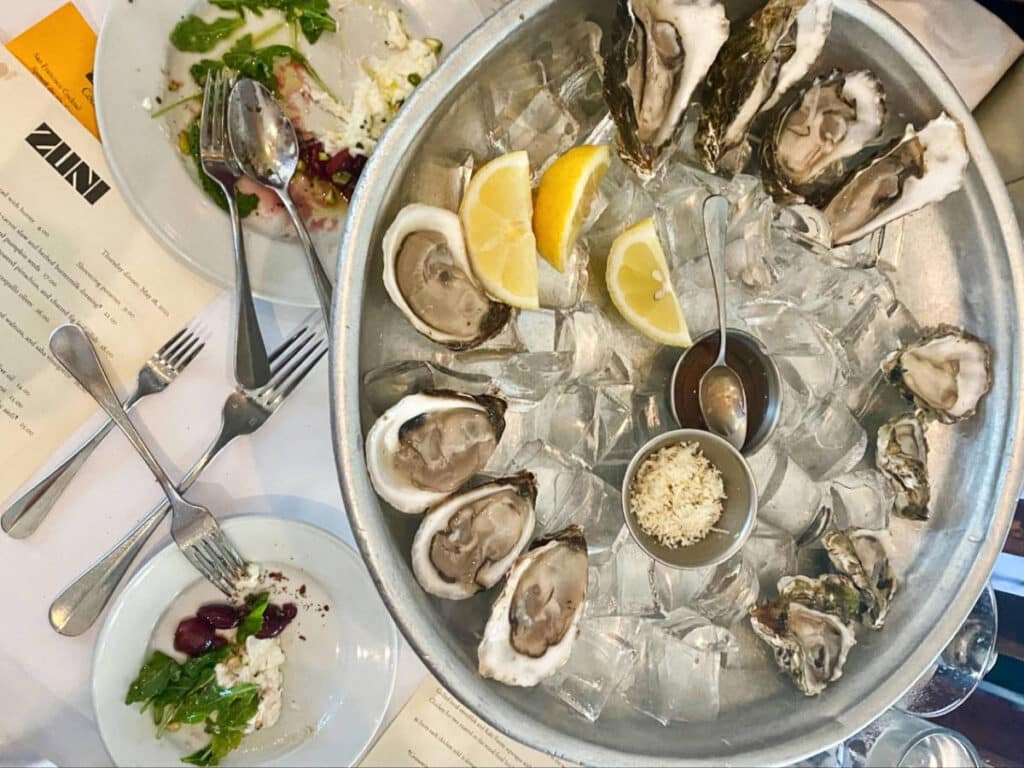 Fresh oysters on ice with lemon at Zuni
